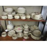 A Denby brown glazed dinner/teaset with floral decoration