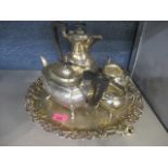 A silver plated four piece teaset and a tray