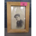 A photograph of Jack Cornwall VC, framed and glazed with inscription and a pack of stamps