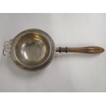 An early 20th century silver tea strainer, Birmingham 1935, marks for Robert Pringle & Sons, total