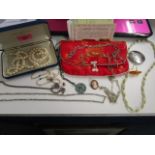 A selection of costume jewellery to include a white metal and turquoise set pendant, a silver and