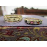 A 9ct gold seven stone ring, line set in various coloured stones, and a 9ct gold eternity ring set