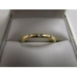 An 18ct yellow gold and diamond set ring