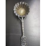 A Chinese Silver tea strainer