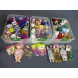 A large collection of Beanie Babies to include official collectors cards and other toys