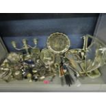 A mixed lot of cutlery and silver plated items to include a candelabra