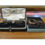 A 15ct gold, amethyst and pearl brooch, cased, a 15ct gold, diamond and rub set ring (one diamond