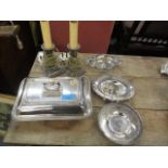 A small selection of silver plate to include an entree dish, salt spoons, three assorted plated