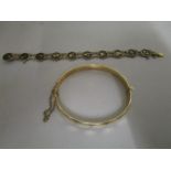 An L & Co 9ct gold metal core bracelet, and a Japanese Amita damascened plaque bracelet