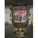 A silver plated Champagne bucket, urn shaped with fluted lower half, twin lion mask, ring handles