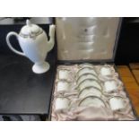 A Wedgwood 'Osborne' presentation box of coffee cans with saucers and matching coffee pots