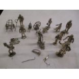 A small selection of silver plated figures, mostly in the form of towns people