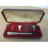 A silver Dunhill cigarette holder with interchangeable mouth pieces, boxed