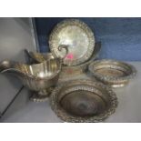 Silver plate to include a Garrards helmet shaped sauce boat, a waiter, a bread basket and a pair