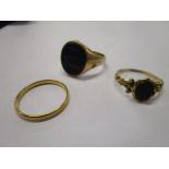 A 9ct gold and bloodstone signet ring, 5.3g and a smaller plated bloodstone signet ring, along