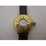 An early 20th century J W Benson 18ct gold, half hunter fob watch, converted to a wristwatch, having