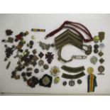 Military related items to include a WWI Victory medal and a British War medal inscribed 2 Lieut A