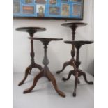 Two 20th century mahogany pedestal wine tables, each on a tripod base, largest 23" h