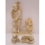 A group of four late 19th/early 20th century Japanese and Chinese carved ivory figures, a man