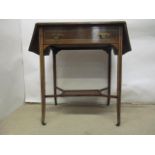 A 19th century French mahogany commode having a marbled top over a cushion moulded drawer and