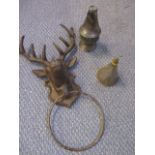 A towel rail in the form of a deer, a small vintage oil can and the top section of a silver vase