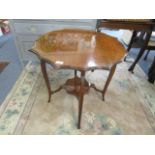 An early 20th century mahogany, two tier occasional table, 25 1/2" dia