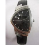 A Hamilton Ventura Menin black gents quartz, stainless steel, modern wristwatch having a black dial,
