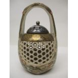 An early 20th century Japanese Satsuma basket with a handle decorated with warriors on horseback and