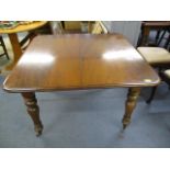 A Victorian mahogany extendable dining table with one leaf, 28" x 41" x 41" un-extended, 28" x 59" x