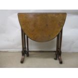 A Victorian burr walnut Sutherland table with D shaped fall flaps and fluted columns, raised on