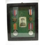 A group of four WWII medals, a Defence, 1939-1945, a 1939-45 Star and a France and German Star and a