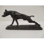 Emmanuel Fremiet (French 1824-1910) - a cast bronze model of a dog stretching its hind leg, on a