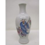 A 20th century Chinese vase of ovoid form decorated with a man carrying a staff and flowers and a