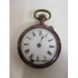 A late 19th/early 20th century gilt metal ladies fob watch having a purple enamelled case and