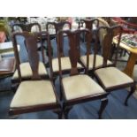 A set of six matched Queen Anne style mahogany dining chairs
