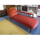 An Edwardian chaise longue with terracotta velour upholstery, 66" long