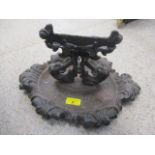 A Victorian cast iron boot scraper