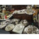 A large selection of silver plate to include trays, tea sets, a soda syphon, entree dishes and other