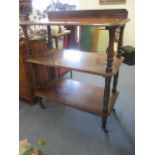 A Victorian mahogany three tier buffet, 40" x 35" x 19"