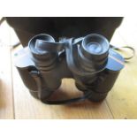 A pair of Prinz 10 x 50 field binoculars in travel case