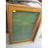 A light oak display cabinet, 36" x 25"