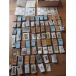A large collection of loose early to Mid 20th Century Wills cigarette cards and three albums to