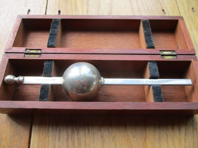 An early 20th century Kelvin, Bottomly and Baird Ltd Marine Hydrometer in mahogany case