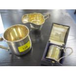 Three silver items to include a small creamer A/F, a lidded mustard and a christening mug