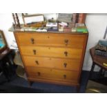 A 1930s oak chest of four drawers, standing on square, tapering legs, 40 1/2" h x 32 1/2"w, 20" deep