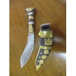 A Nepalese kukri with brass fittings