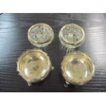 Two pairs of salts, one pair having a silver rim above cut glass and the other solid silver 79.3g