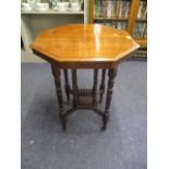 A Victorian mahogany two tier octagonal occasional table, 28" h