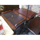 A late Victorian mahogany extending dining table having four reeded legs and two extra leaves, 29" h