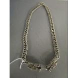 A heavy Chinese silver plated, curb link gents necklace, the ends terminating in dragon heads